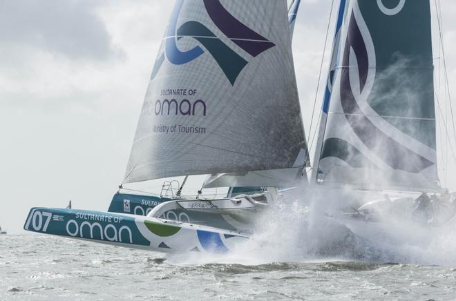 The Seven Star Round Britain and Ireland 2014, race start. Cowes. Isle of Wight. The Oman Sail MOD70 trimaran in action, skippered by Sidney Gavignet (FRA) © Lloyd Images