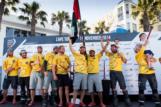 November 5, 2014. Abu Dhabi Ocean Racing celebrate on stage after crossing the finish line in Cape Town as the winners of Leg one. - Volvo Ocean Race 2014-15 ©  Ian Roman / Abu Dhabi Ocean Racing