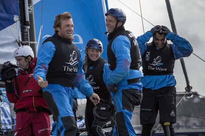The Wave, Muscat. Skippered by Leigh McMillan (GBR) with tactician Sarah Ayton (GBR), trimmer Peter Greenhalgh (GBR), headsail trimer Kinley Fowler (NZL) and bowman Nasser Al Mashari (OMA) Celebrating their win in Cardiff during Act 5 of the Extreme Sailing Series. © Lloyd Images/Extreme Sailing Series
