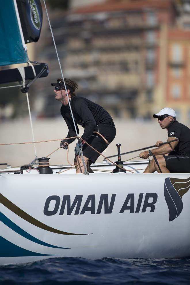 2014 Extreme Sailing Series - Hard at work onboard Oman Air © Lloyd Images/Extreme Sailing Series