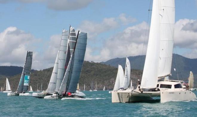 Multihull Racing fleet was led by Apc Mad Max from start line to finish on day three - Vision Surveys 25th Airlie Beach Race Week 2014  © Airlie Beach Race Week media
