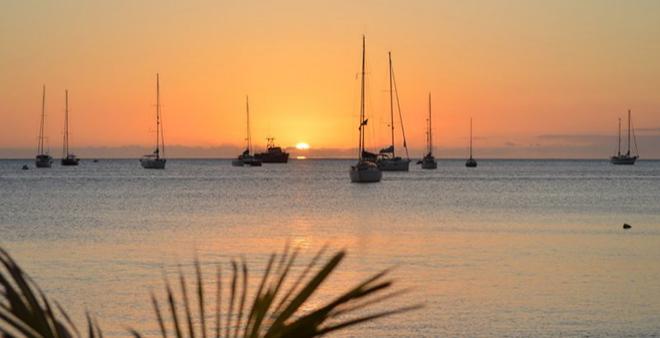 Sunset -all is calm but what about a dinghy trip back to your boat at night, if there is a strong offshore breeze?  © SW