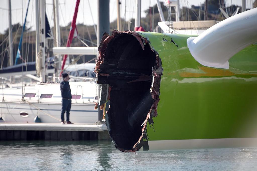 French skipper Thomas Coville's damaged Class Ultime multihull `` Sodebo Ultim' `` arrives in Roscoff harbour after hittting a cargo boat during the 10th edition of the Route du Rhum sailing race in Saint-Malo, western France, on November 3, 2014. The Route du Rhum is a solo race held every four years between Saint-Malo to Pointe-a-Pitre, in the French West Indies. AFP PHOTO / DAMIEN MEYER photo copyright @ AFP taken at  and featuring the  class
