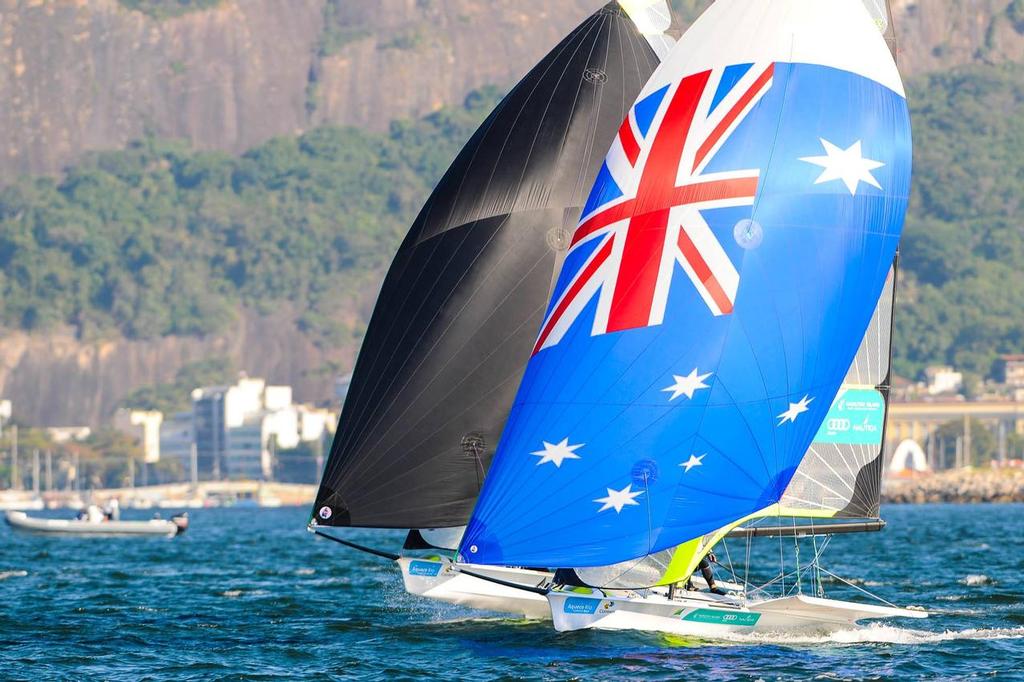 Burling and Tuke climb over the Australian 49er crew - Day 7 - Aqueece Rio – International Sailing Regatta 2014 photo copyright ISAF  taken at  and featuring the  class