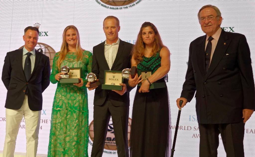 ISAF Sailor of the Year Award winners Kahena Kunze, Jimmy Spithill amd Martine Grael with HM King Constantine (right) and a Rolex representative (left) © ISAF 