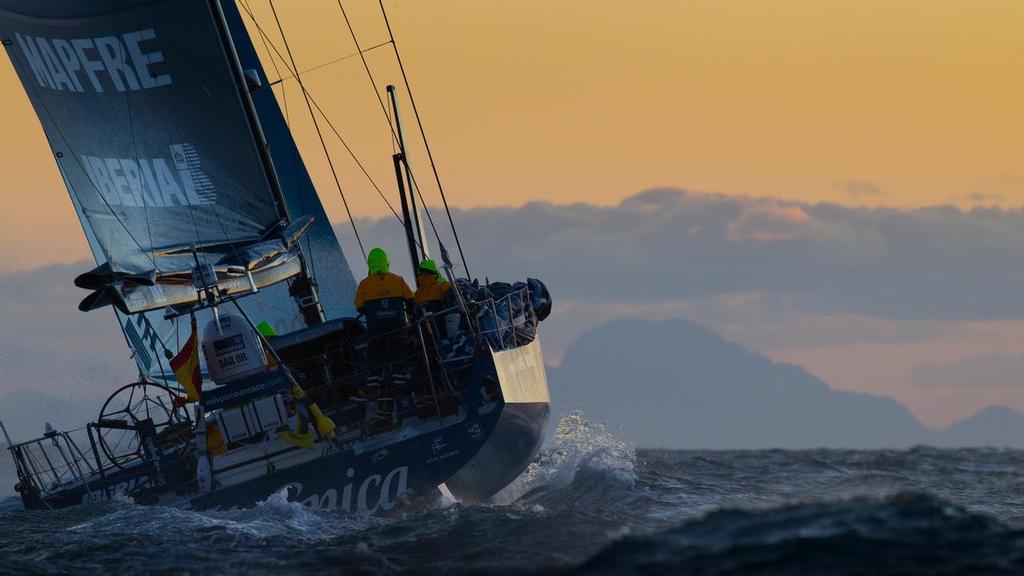 Team Telefonica on their way to Gibraltar at sunset, on leg 1 of the Volvo Ocean Race 2011-12 from Alicante, Spain to Cape Town, South Africa. photo copyright Volvo Ocean Race http://www.volvooceanrace.com taken at  and featuring the  class