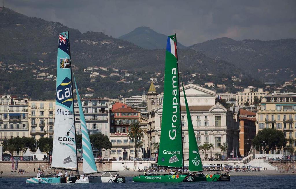 GAC Pindar and Groupama sailing team racing just metres from the shore on the opening day in Nice. © Lloyd Images/Extreme Sailing Series