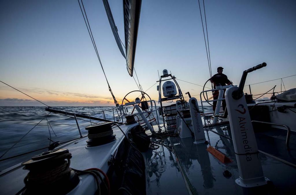 Matt Noble takes Alvimedica 4 back towards England in sunset solitude during the RORC's Round Britain and Ireland Race. photo copyright  Amory Ross / Team Alvimedica taken at  and featuring the  class