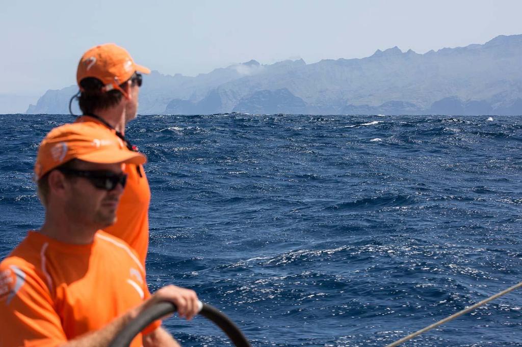 Ryan Houston guides Alvimedica around Santa Antao, the westernmost island of the Cape Verdes, under the watchful guidance of navigator Will Oxley. ©  Amory Ross / Team Alvimedica