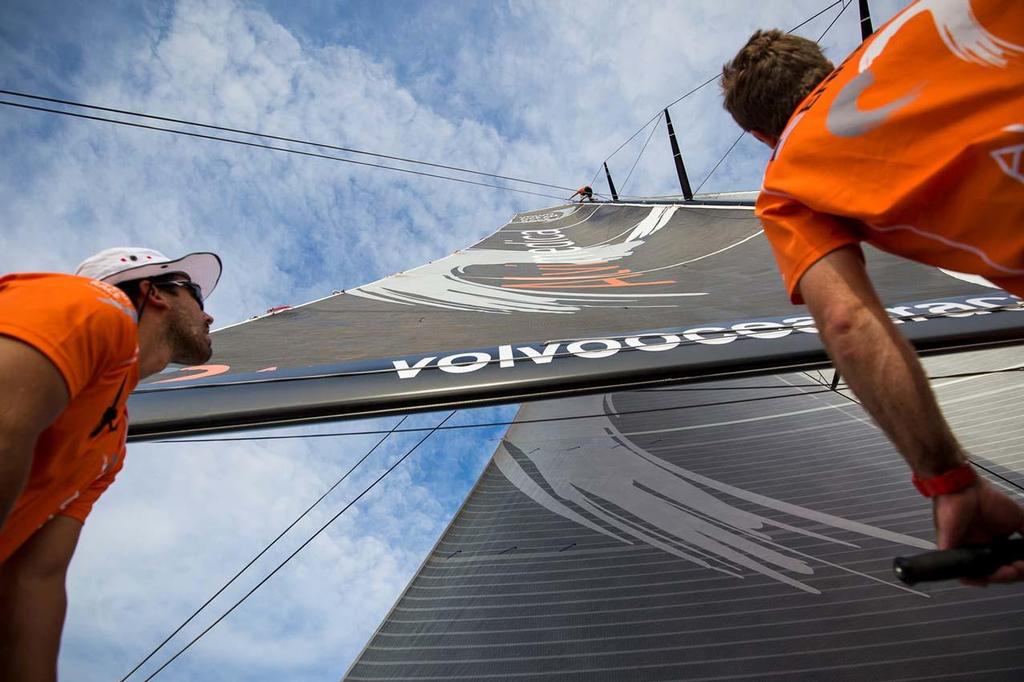 October 21, 2014.  Leg 1 onboard Team Alvimedica. Day 10 brings the fleet into the ITCZ and the notoriously challenging Doldrums, an area of volatile and unpredictable weather. Nick Dana goes up the rig to look for wind, while Mark Towill (L) and Charlie Enright (R) eagerly await an update. Volvo Ocean Race ©  Amory Ross / Team Alvimedica