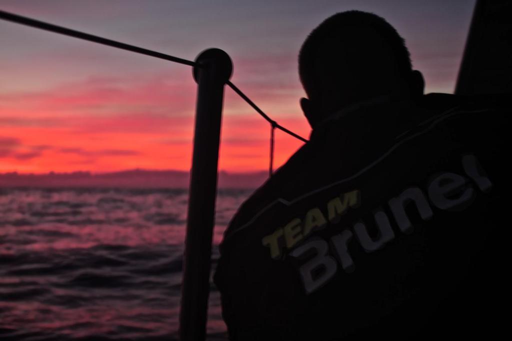 October 14, 2014. Leg 1. Sun sets onboard Team Brunel. © Stefan Coppers/Team Brunel