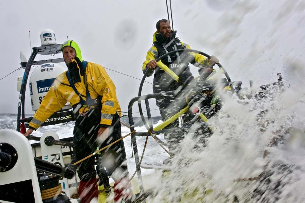 Leg 1 onboard Team Brunel. Waves crash over the boat as the team head further south.  © Stefan Coppers/Team Brunel