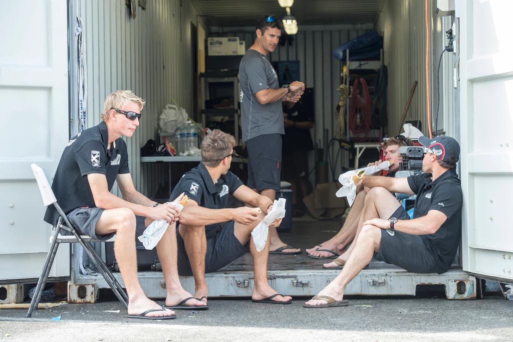 Emirates Team New Zealand sailors Edwin De Laat, Blair Tuke, Jeremey Lomas, Peter Burling and Glenn Ashby having lunch at the teams shore base container before racing on day four of the Extreme Sailing Series Regatta at Nice. 5/10/2014 © Chris Cameron/ETNZ http://www.chriscameron.co.nz