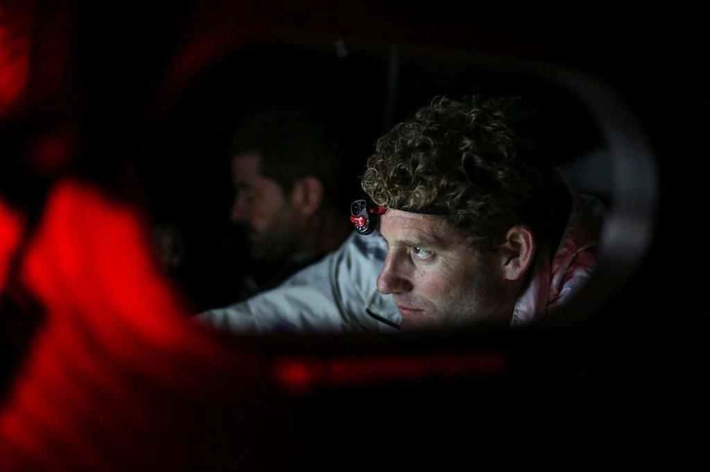 2014-15 Volvo Ocean Race. DRT Leg 1 October 11, 2014. Leg 1 onboard Dongfeng Race Team. Charles Caudrelier, working hard on the nav station as well photo copyright Yann Riou / Dongfeng Race Team taken at  and featuring the  class