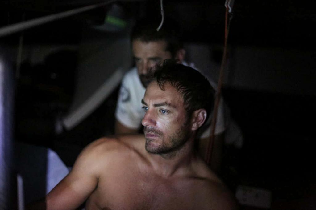 October 21, 2014. Leg 1 onboard Dongfeng Race Team. Pascal Bidegorry watching the weather forecast and their heading intensely when sailing into the Doldrums. Volvo Ocean Race photo copyright Yann Riou / Dongfeng Race Team taken at  and featuring the  class
