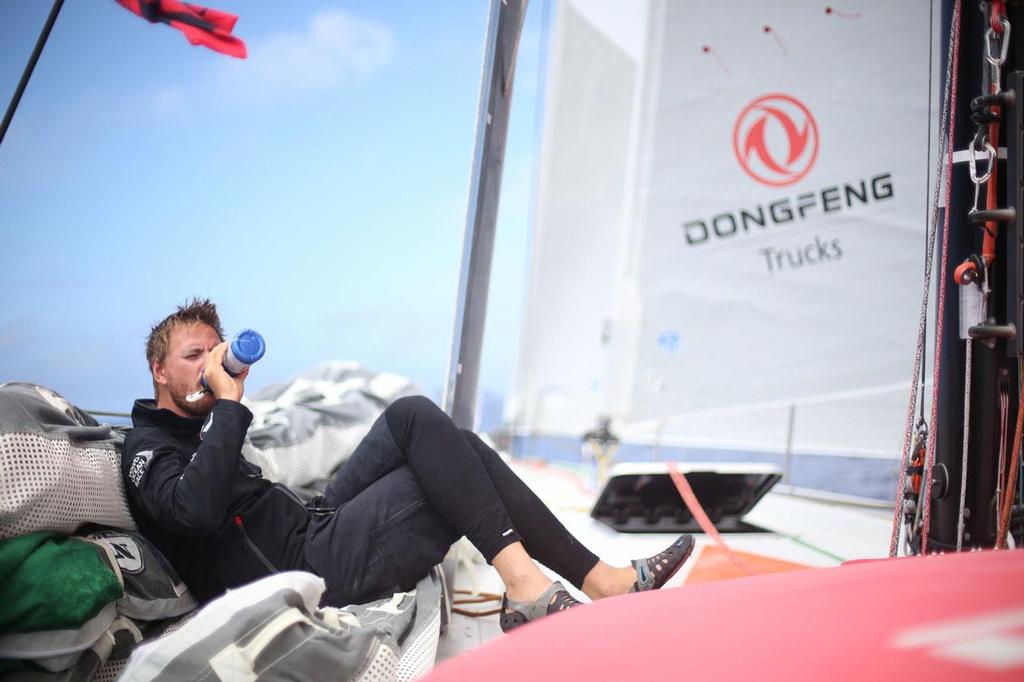 Volvo Ocean Race - October 29, 2014. Leg 1 onboard Dongfeng Race Team. Martin StrÃ¶mberg, quiet minutes on deck. photo copyright Yann Riou / Dongfeng Race Team taken at  and featuring the  class