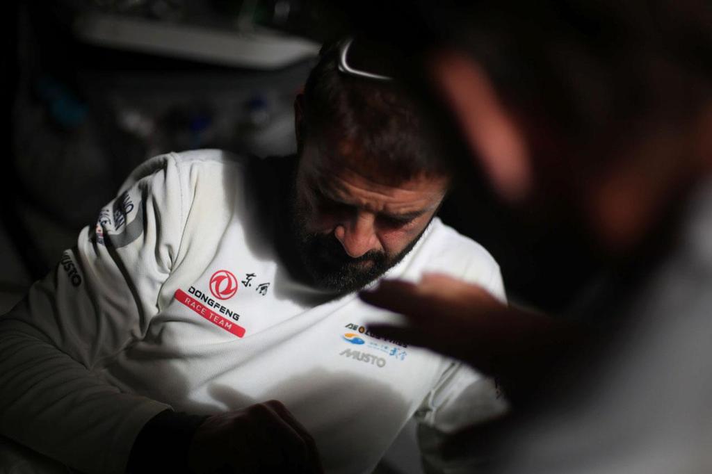 Volvo Ocean Race - October 29, 2014. Leg 1 onboard Dongfeng Race Team. Pascal BidÃ©gorry during tactical talks. photo copyright Yann Riou / Dongfeng Race Team taken at  and featuring the  class