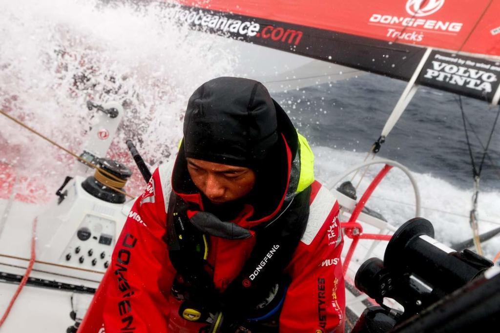 Volvo Ocean Race - October 31, 2014. Leg 1 onboard Dongfeng Race Team. Jin Hao Chen on watch in the forties. photo copyright Yann Riou / Dongfeng Race Team taken at  and featuring the  class