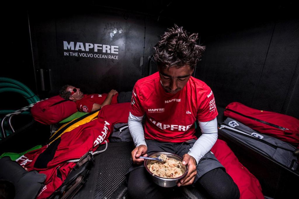 Michel Desjoyeaux is getting some well needed sleep, whilst Andre Fonseca, aka Bouchecha, is regaining some energy with food. © Volvo Ocean Race - Team Campos - Francisco Vignale http://www.volvooceanrace.com/