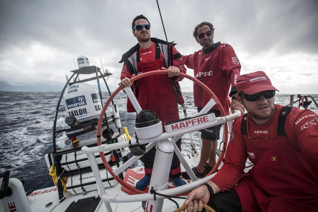 October 23, 2014. Leg 1 onboard MAPFRE. Anthony Marchand at the helm, with Michel Desjoyeaux and Antonio Cuervas-Mons, aka Ã‘eti. © Francisco Vignale/Mapfre/Volvo Ocean Race