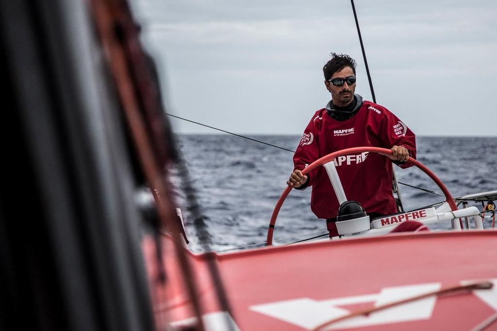 Volvo Ocean Race - October 27, 2014. Leg 1 onboard MAPFRE. Andre Fonseca on helm heading South photo copyright Francisco Vignale/Mapfre/Volvo Ocean Race taken at  and featuring the  class