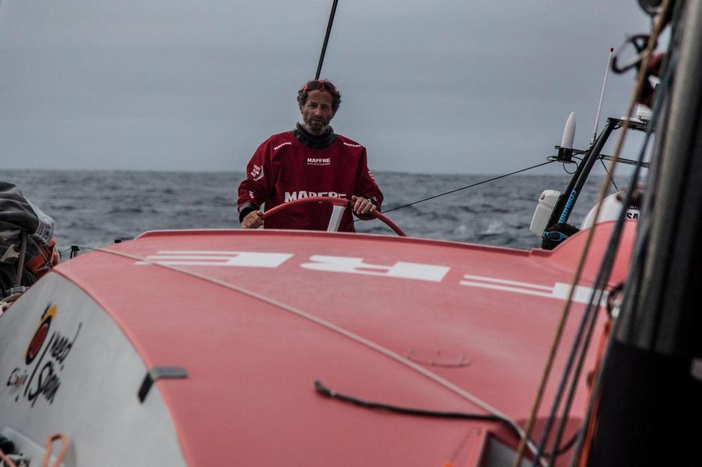 Michel Desjoyeaux steering the boat. © Francisco Vignale/Mapfre/Volvo Ocean Race