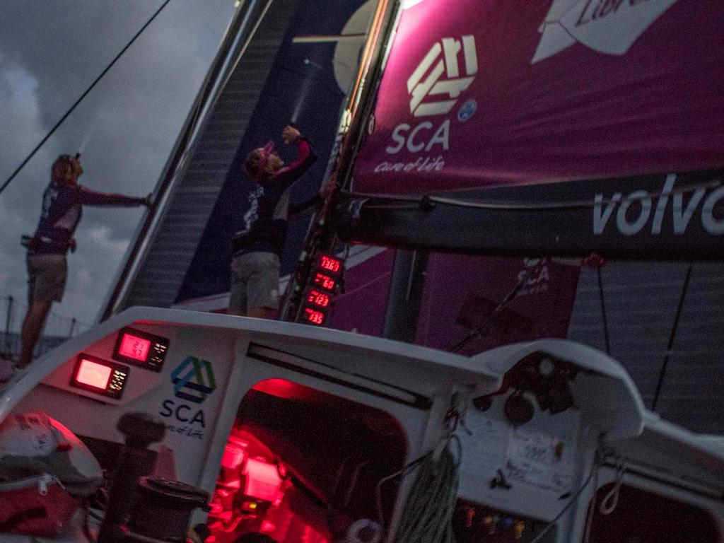 October 20, 2014 - Volvo Ocean Race - Annie Lush checks the trim while Abby Lush checks the rig set up. photo copyright Corinna Halloran / Team SCA taken at  and featuring the  class