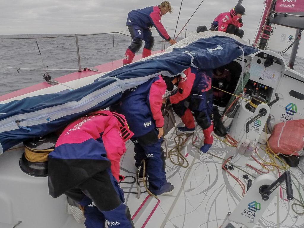 November 2, 2014. Leg 1 onboard Team SCA. Team SCA prepares for one of the day's pivotal gybes to head to Cape Town. © Corinna Halloran / Team SCA