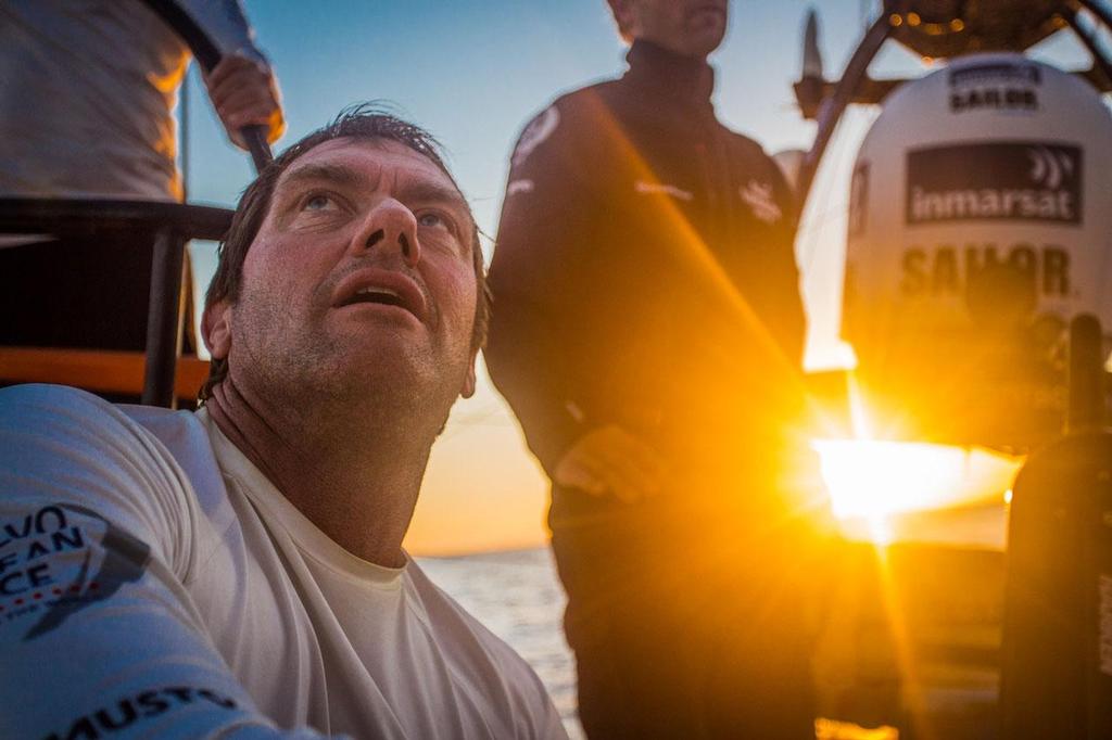2014-15 Volvo Ocean Race - October 16, 2014. Leg 1 onboard Team Vestas Wind. Tony Rae studies the trim on sails at day break on Day 5 photo copyright Brian Carlin - Team Vestas Wind taken at  and featuring the  class