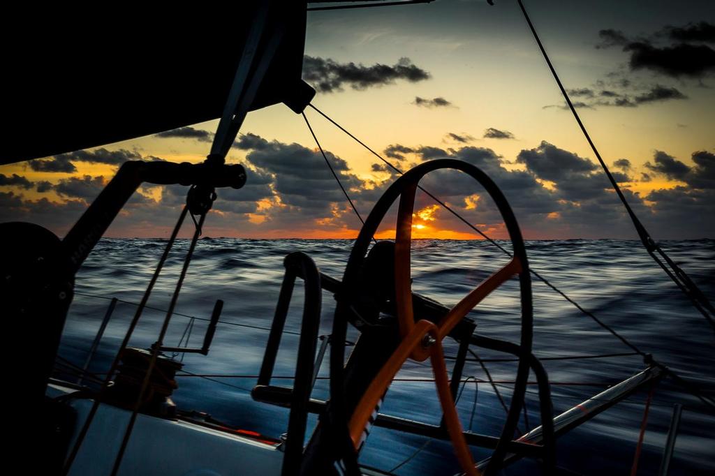 October 25, 2014. Leg 01, On-board Team Vestas Wind. Sunset on day 14 for Team Vestas Wind on the Volvo Ocean Race. photo copyright Brian Carlin - Team Vestas Wind taken at  and featuring the  class