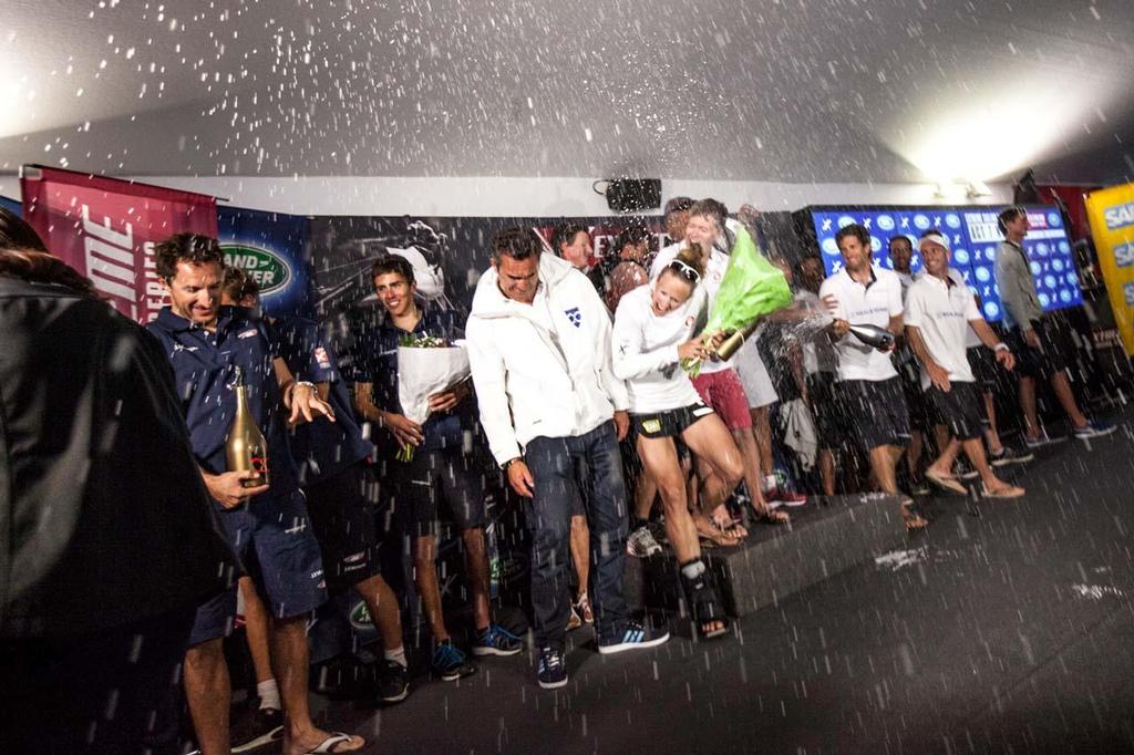 The team take to the podium with Realstone and event winners, Alinghi - 2014 Extreme Sailing Series Act 7 photo copyright Harry Kenney-Herbert taken at  and featuring the  class