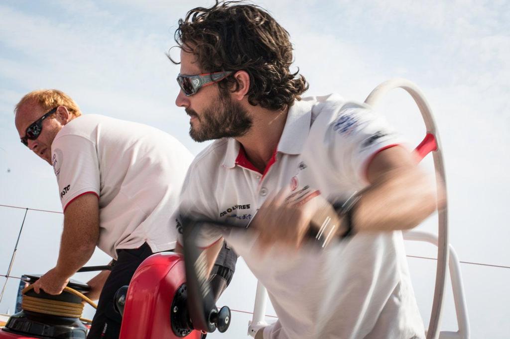 HRH Prince Carl Philip of Sweden at the grinder of Dongfeng Race Team during the ProAm Race for the Volvo Ocean Race. ©  Marc Bow / Volvo Ocean Race