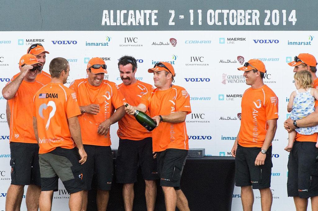 2014-15 Volvo Ocean Race - Team Alvimedica collecting their award and enjoying the champagne after winning the Alicante In-Port Race. ©  David Ramos / Volvo Ocean Race