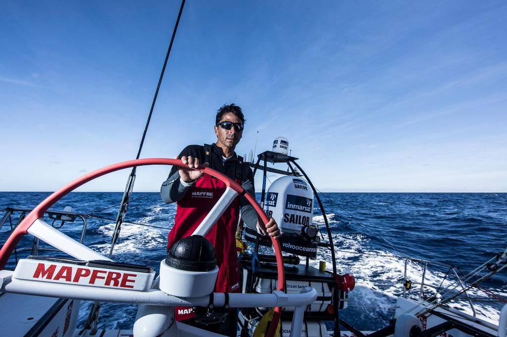 2014-15 Volvo Ocean Race - Leg 1 onboard MAPFRE: Andre Fonseca aka Bochecha at the helm, driving the team towards Lanzarote photo copyright Volvo Ocean Race - Team Campos - Francisco Vignale http://www.volvooceanrace.com/ taken at  and featuring the  class