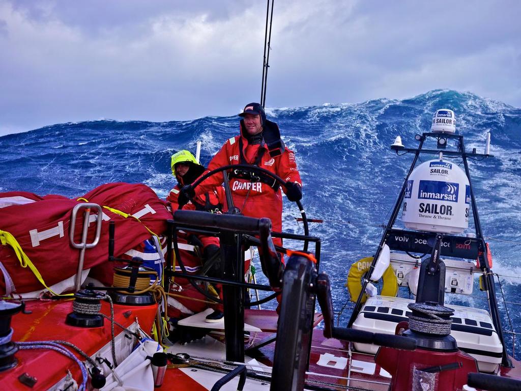 Tony Rae nursing the boat through monster Southern Ocean waves onboard  Camper with Emirates Team New Zealand during leg 5 of the Volvo Ocean Race 2011-12, from Auckland, New Zealand to Itajai, Brazil. (Credit: Hamish Hooper/Camper ETNZ/Volvo Ocean Race) © Volvo Ocean Race http://www.volvooceanrace.com