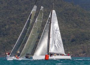 Pretty Fly III, Patrice and Victoire at the windward mark. Little separated them throughout the 42nm passage race - Vision Surveys Airlie Beach Race Week 2014 photo copyright Shirley Wodson taken at  and featuring the  class