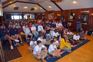 Junior sailors listen to the NSHOF Inductees during a standing room only gathering. photo copyright NSHOF / Marcin Chumiecki taken at  and featuring the  class