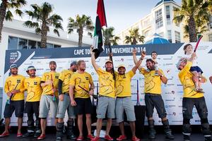 November 5, 2014. Abu Dhabi Ocean Racing celebrate on stage after crossing the finish line in Cape Town as the winners of Leg one. - Volvo Ocean Race 2014-15 photo copyright  Ian Roman / Abu Dhabi Ocean Racing taken at  and featuring the  class