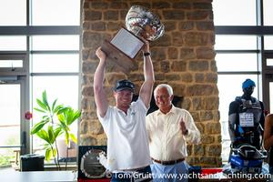 2014 International Moth World Championship - Outteridge celebrates victory photo copyright Tom Gruitt / yachtsandyachting.com taken at  and featuring the  class
