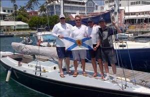 Peter Wickwire and crewmates Matthew Cairney, Rick Echard and Greg Lawrence show their colours in Bermuda in May photo copyright Colin Thompson taken at  and featuring the  class