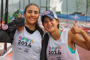 Smiles in the rain - Nanjing 2014 Youth Olympic Games photo copyright ISAF  taken at  and featuring the  class
