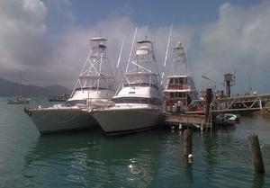 Sportsfisherman bunker at Cooktown before the Lizard Island Marlin Tournament. photo copyright  John Curnow taken at  and featuring the  class