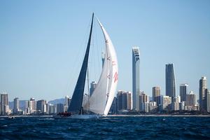 Wild Oats XI aiming at the finish against Gold Coast backdrop. - Land Rover Sydney Gold Coast Yacht Race 2014 photo copyright Michael Jennings taken at  and featuring the  class