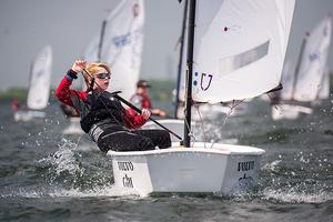 A young sailor competes at one of the three annual Volvo Gill Optimist Championship events. photo copyright Amy Cada taken at  and featuring the  class