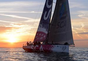 Team SCA at the finish of the Sevenstar Round Britain and Ireland Race photo copyright Rick Tomlinson / RORC http://www.rorc.org taken at  and featuring the  class