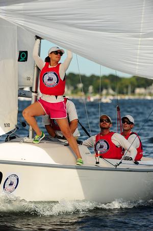 Newport Harbor Yacht Club bowperson Taylor Grimes jibes the spinnaker pole en route to a Red Fleet win for the Southern California club. photo copyright Allen Clark/Photoboat.com taken at  and featuring the  class