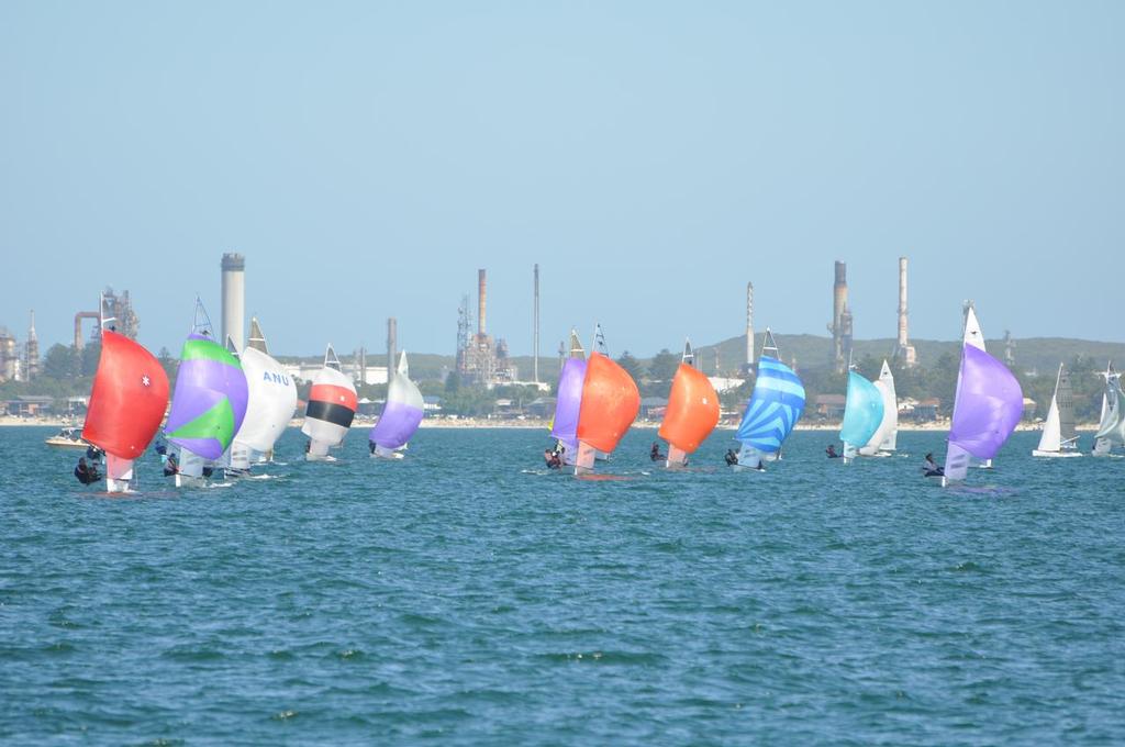 Some of the 42 boat fleet on the chase in the moderate conditions that typified the series © Lou Hollis