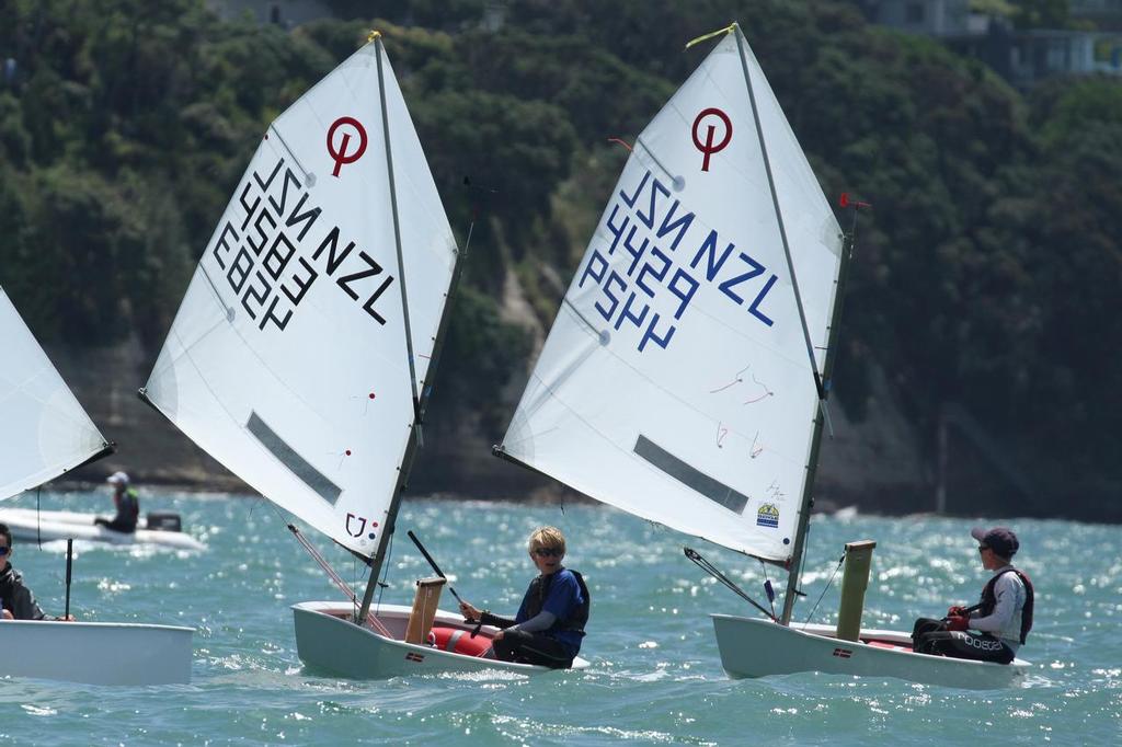 Open fleet winner Robbie McCutcheon (4429) with Tanner Cup winner Sam Bacon (4429) using a J sail - also from Doyle Sails - 2015 Auckland Optimist Championships, Wakatere photo copyright Richard Gladwell www.photosport.co.nz taken at  and featuring the  class