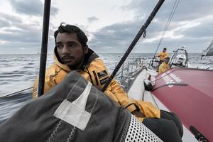 January 7, 2015. Leg three onboard Abu Dhabi Ocean Racing. Adil keeps his weight forward in light winds in the Indian Ocean - Volvo Ocean Race 2014-15. photo copyright Matt Knighton/Abu Dhabi Ocean Racing taken at  and featuring the  class