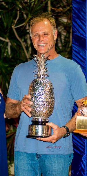 Shockwave’s Reggie Cole accepts the top prize for the Pineapple Cup – Montego Bay Race in 2013. photo copyright sukimacphoto.com taken at  and featuring the  class